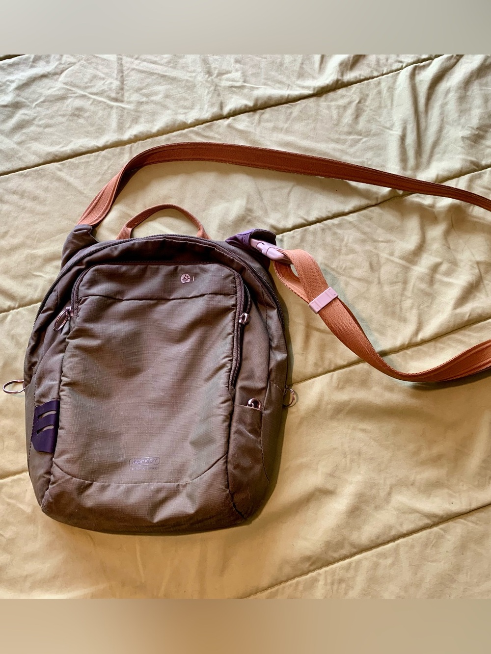 Pacsafe Olive Green Crossbody Backpack with Tan Strap